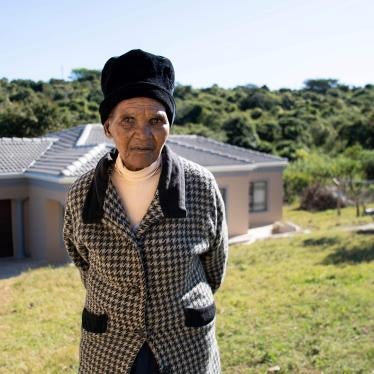 Nozala Ndoyana, 84, in front of her home